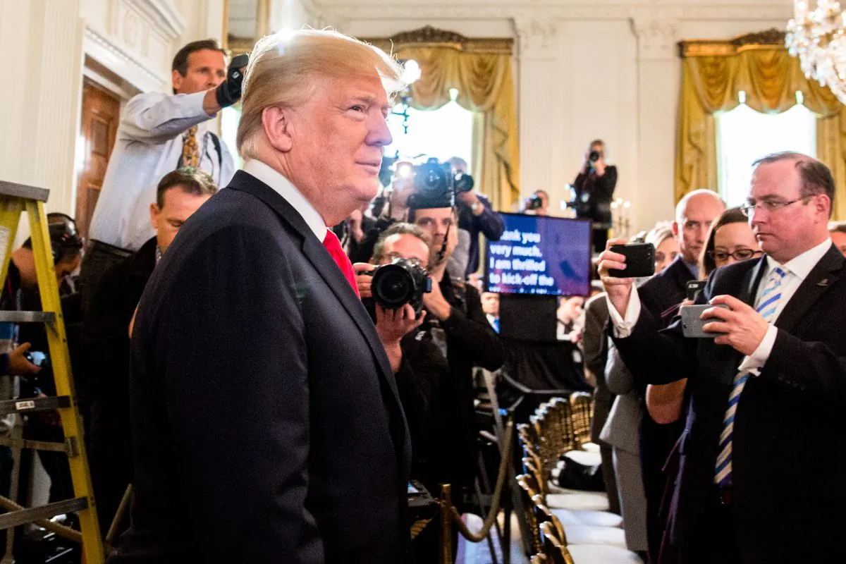President Donald Trump arrives to deliver remarks at the Wounded Warrior Project Soldier Ride in the East Room of the White House on April 26, 2018. (Samira Bouaou/The Epoch Times)