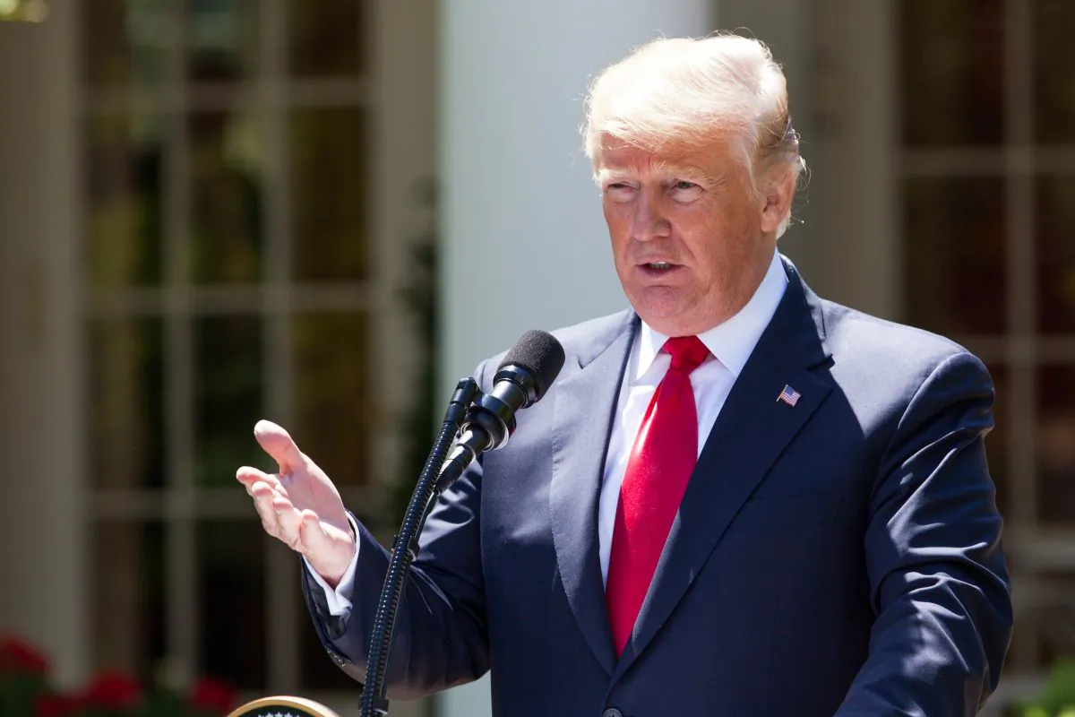 President Donald Trump hosts a joint press conference with President Muhammadu Buhari (not pictured) of the Federal Republic of Nigeria in the Rose Garden of the White House in Washington on April 30, 2018. (Charlotte Cuthbertson/The Epoch Times)