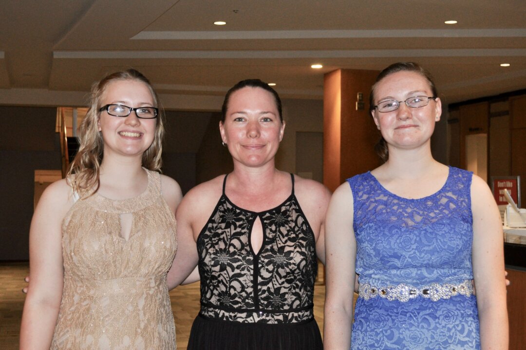 Jess James and her two daughters, Rainy (L) and Venus (R) attended Shen Yun's performance at the Tulsa Performing Arts Center - Chapman Music Hall in Tulsa, Okla., on May 2, 2018. "It was truly amazing, once-in-a-lifetime experience. ... I cried. And it was very moving and enlightening," said Mrs. James. (Amy Hu/The Epoch Times)