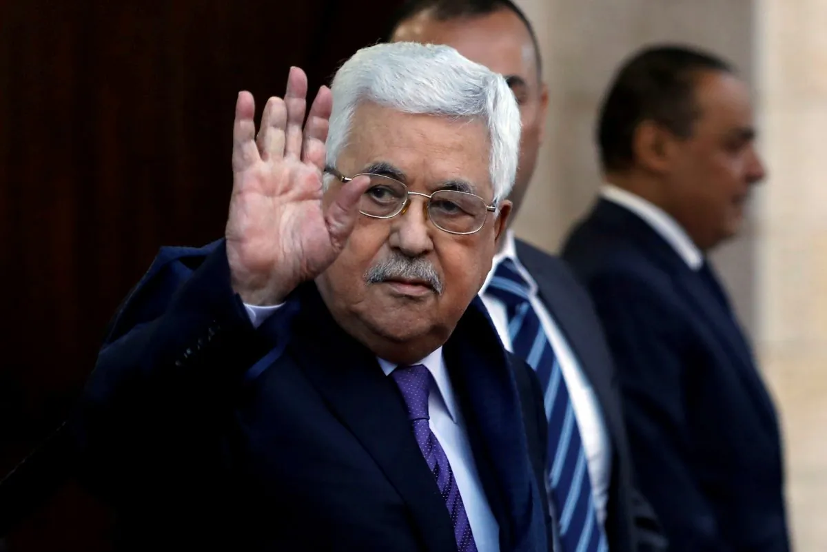 Palestinian President Mahmoud Abbas waves in Ramallah, in the occupied West Bank May 1, 2018. Picture taken May 1, 2018. (Reuters/Mohamad Torokman/File Photo)