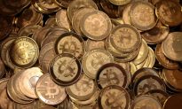Bitcoin Frenzy Settles Down as Big Players Muscle Into Market