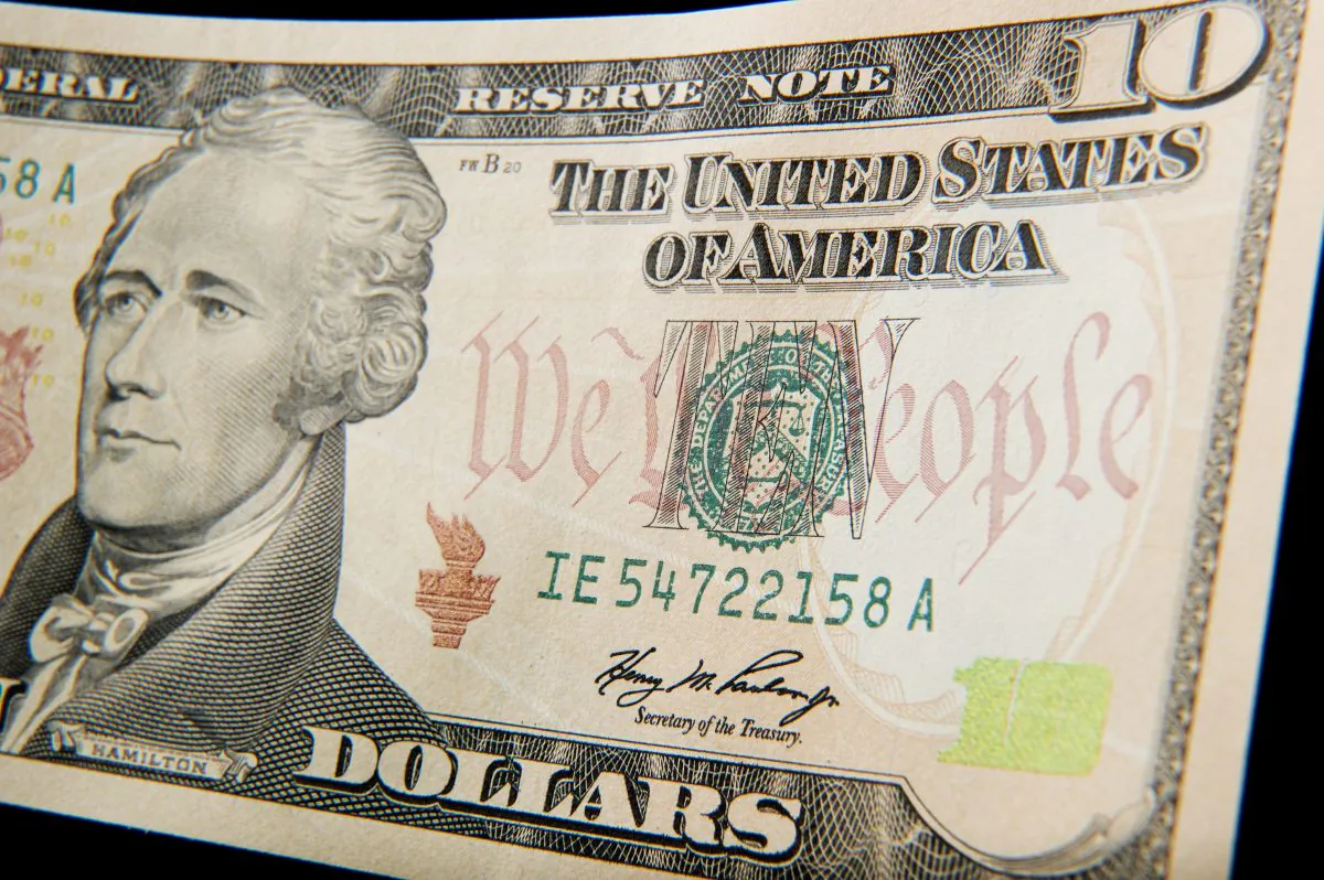 A 10-dollar bill bearing the portrait of Alexander Hamilton, in Washington, D.C., on Dec. 7, 2010. (Paul J. Richards/AFP/Getty Images)