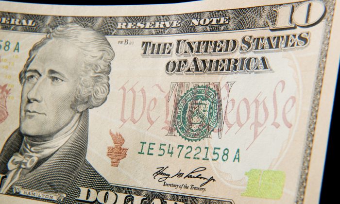 A 10-dollar bill bearing the portrait of Alexander Hamilton, in Washington, D.C., on Dec. 7, 2010. (Paul J. Richards/AFP/Getty Images)