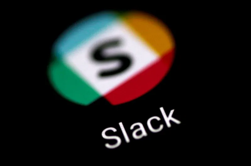 The Slack messaging application is seen on a phone screen Aug. 3, 2017. (Reuters/Thomas White/File Photo)