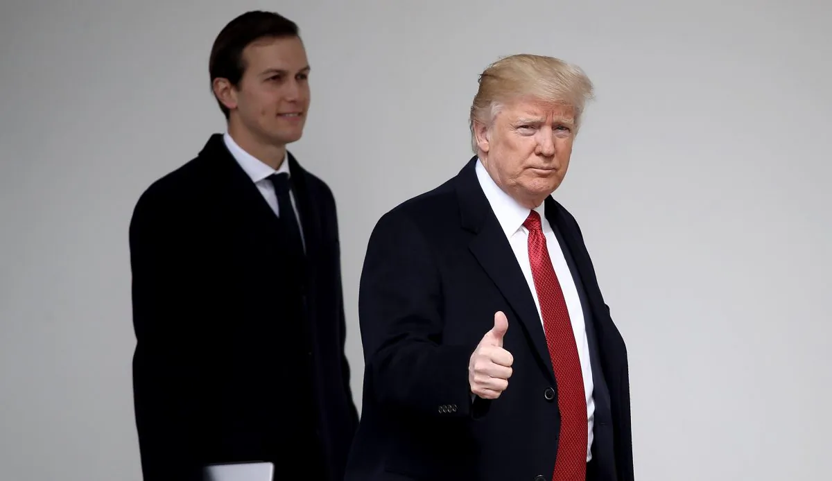 President Donald Trump walks with son-in-law and senior adviser Jared Kushner while departing the White House on March 15, 2017. (Win McNamee/Getty Images)