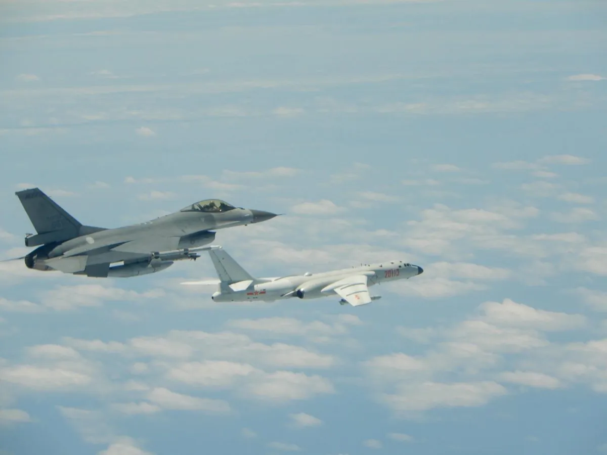 Taiwanese Air Force F-16 fighter jet flies alongside a Chinese People's Liberation Army Air Force (PLAAF) H-6K bomber in the western Pacific, one of the Chinese military aircraft that reportedly flew over Bashi Channel and Miyako Strait near Japan’s Okinawa island chain on the morning of May 11, 2018. (Photo released by Taiwan ROC Air Force)