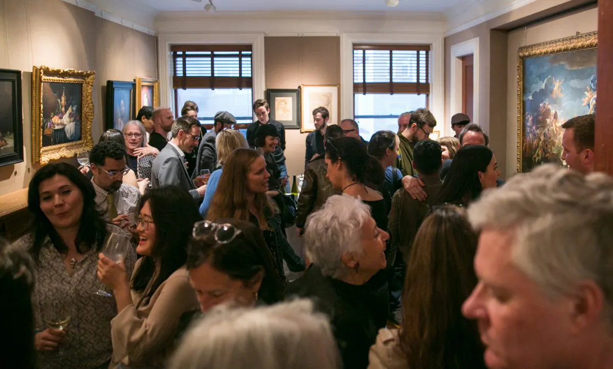 A packed crowd of visitors at the opening of "The Unbroken Line: Old and New Masters" at the Robert Simon Fine Art gallery in Upper East Side, New York, on May 10, 2018. (Milene Fernandez/The Epoch Times)