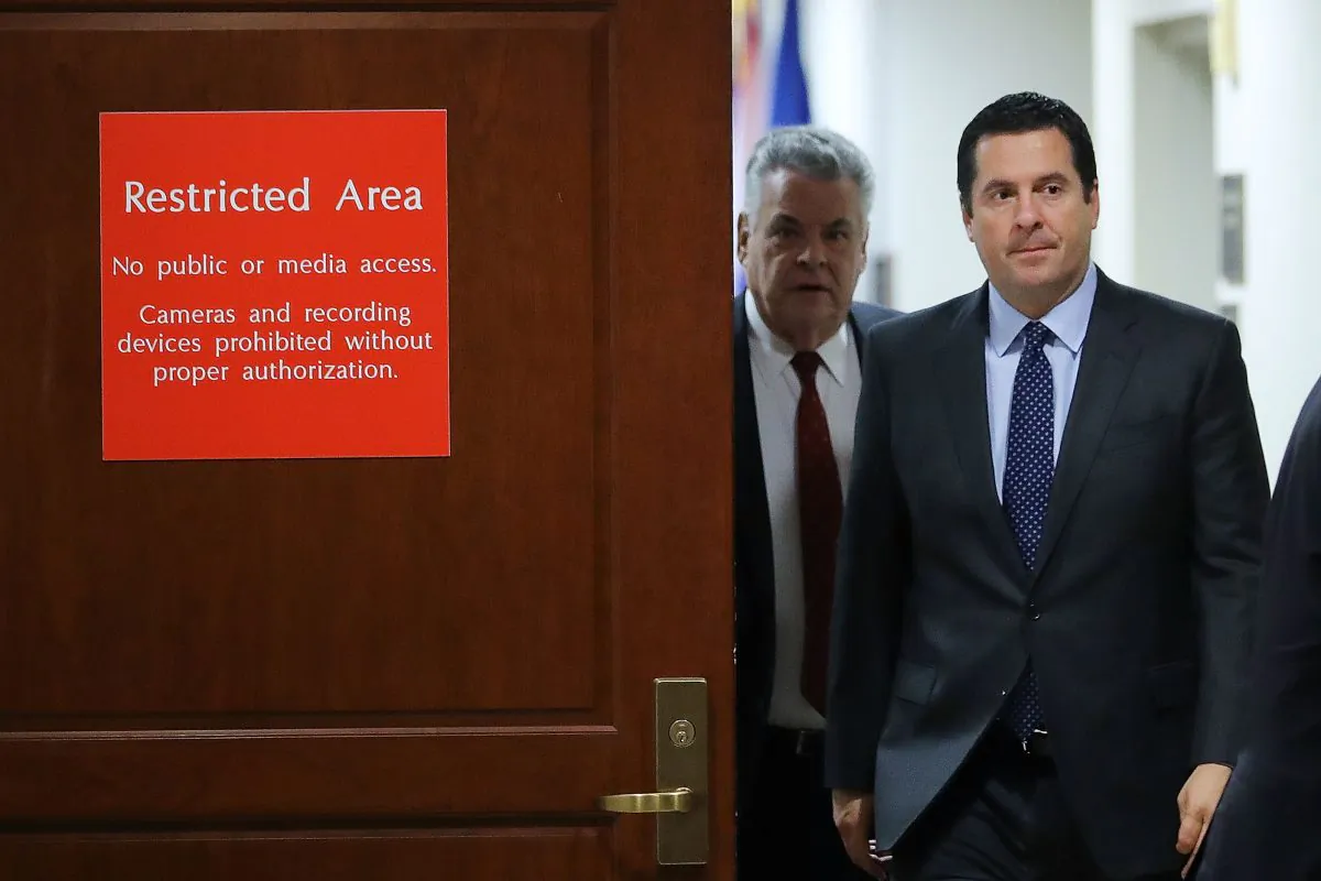 House Intelligence Committee Chairman Devin Nunes (R-CA) (2nd L) and Rep. Peter King (R-NY) leave the committee's secure meeting rooms in the basement of the U.S. Capitol House Visitors Center in Washington, D.C., on Feb. 6, 2018. (Chip Somodevilla/Getty Images)