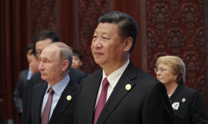 Chinese leader Xi Jinping and Russia's President Vladimir Putin (L) attend a summit for the Belt and Road initiative, at the International Conference Center in Yanqi Lake, north of Beijing, on May 15, 2017. (Lintao Zhang/AFP/Getty Images)