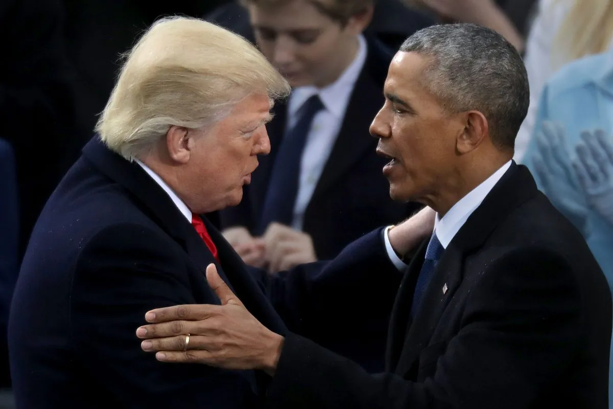Former U.S. President Barack Obama congratulates President Donald Trump after the latter took the oath of office at the Capitol in Washington on Jan. 20, 2017. (Chip Somodevilla/Getty Images)