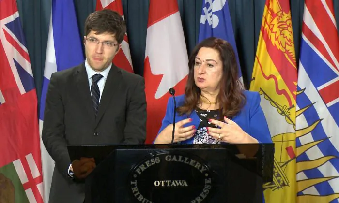 Sen. Salma Ataullahjan speaks about her bill to combat organ trafficking while MP Garnett Genuis looks on at a Parliament Hill press conference in Ottawa on Dec. 12, 2017. (Limin Zhou/The Epoch Times)
