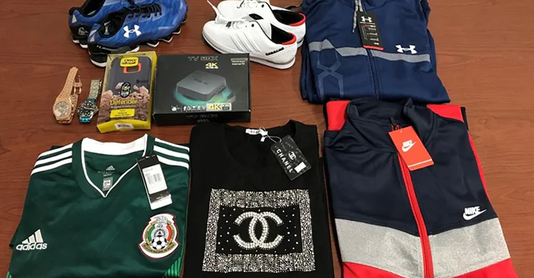 Counterfeit items seized by ICE (Immigration and Customs Enforcement) agents in Laredo, Texas. (Courtesy of ICE)