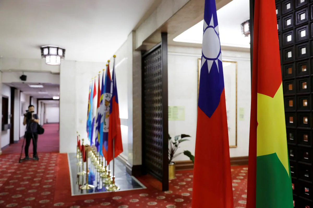 Flags of Taiwan and Burkina Faso (R) are seen inside Taiwan's Ministry of Foreign Affairs in Taipei, Taiwan on May 24, 2018. (Tyrone Siu/Reuters)