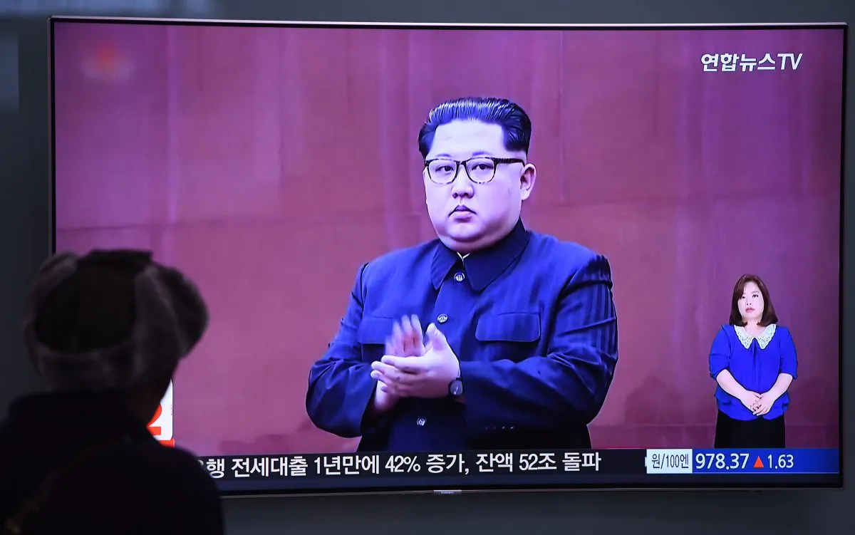 A man watches a television news screen showing North Korean leader Kim Jong Un at a railway station in Seoul on May 16, 2018. (JUNG YEON-JE/AFP/Getty Images)