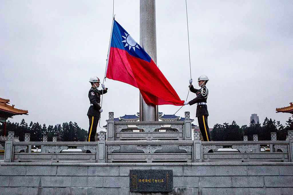 Honor guards raise the Taiwan flag in the Chiang Kai-shek Memorial Hall square on Jan. 14, 2016 in Taipei, Taiwan. (Ulet Ifansasti/Getty Images)