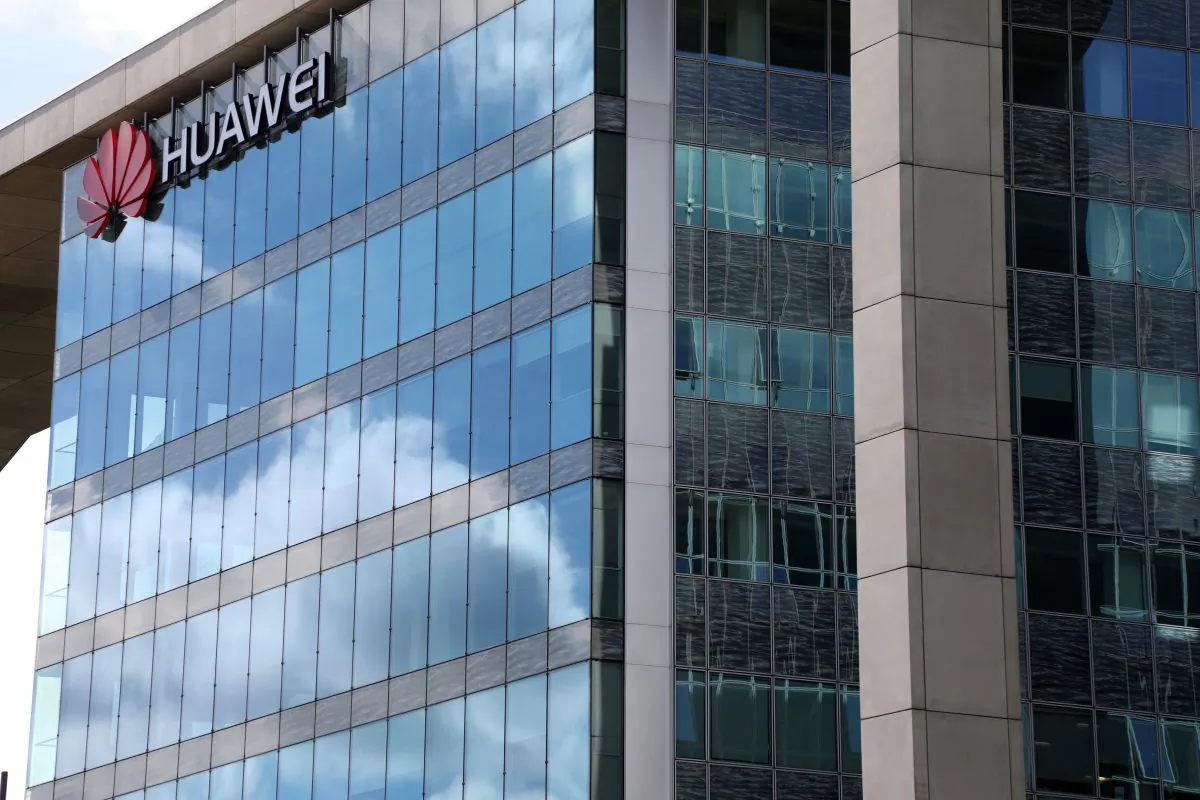 A picture taken on Sept. 4, 2017, in Boulogne-Billancourt, a neighboring suburb of Paris, shows a view of the headquarters of Hewlett-Packard (HP) Company and Chinese multinational networking and telecommunications equipment and services company Huawei. (Ludovic Marin/AFP/Getty Images)