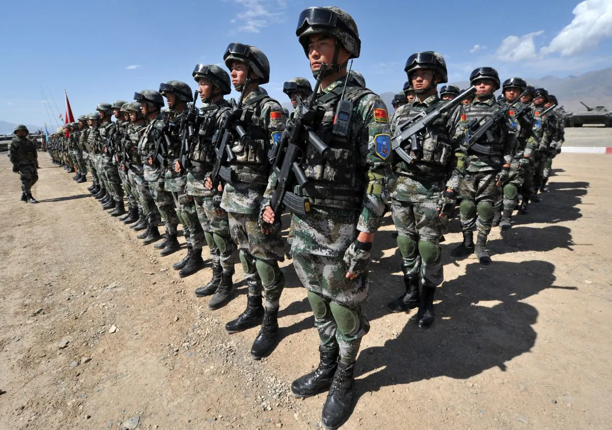 Chinese soldiers stand at attention during a military exercise in this file photo. (VYACHESLAV OSELEDKO/AFP/Getty Images)