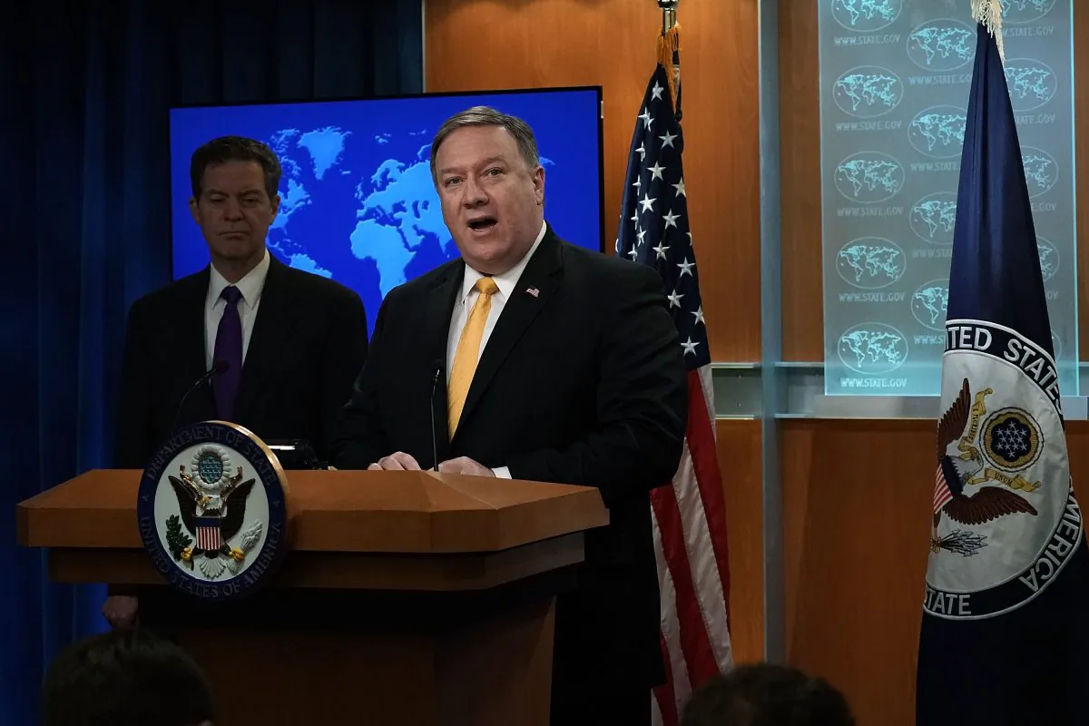 U.S. Secretary of State Mike Pompeo (R) speaks as State Department Ambassador at Large for International Religious Freedom Sam Brownback (L) listens during a press event at the State Department May 29, 2018 in Washington, DC. The State Department held the event to release the 2017 Annual Report on International Religious Freedom.  (Alex Wong/Getty Images)