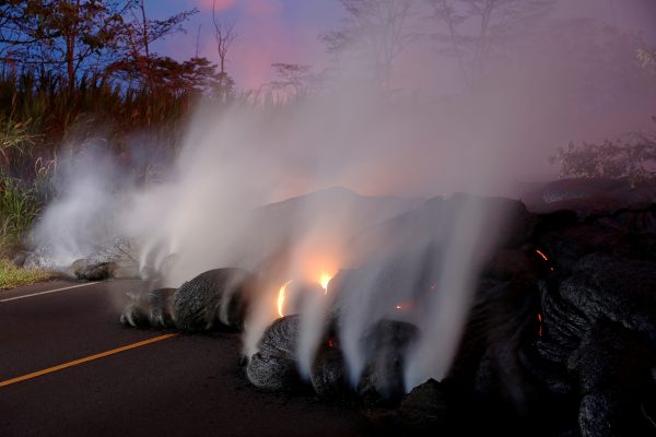 Volcanic gases rise from the Kilauea lava flow that crossed Pohoiki Road near Highway 132, near Pahoa, Hawaii, May 28.