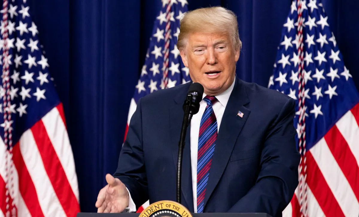 President Donald Trump signs S. 204, the Right to Try Act in the South Court Auditorium of the White House in Washington on May 29, 2018. (Samira Bouaou/The Epoch Times)