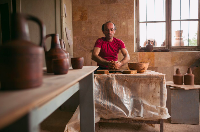 Potter Vahagn Hambardzumyan in his workshop in Sisian, Armenia. He and his wife Zara are bringing their Sisian Ceramics family operation to Washington for the festival. (Narek Harutyunyan/Smithsonian Institution)
