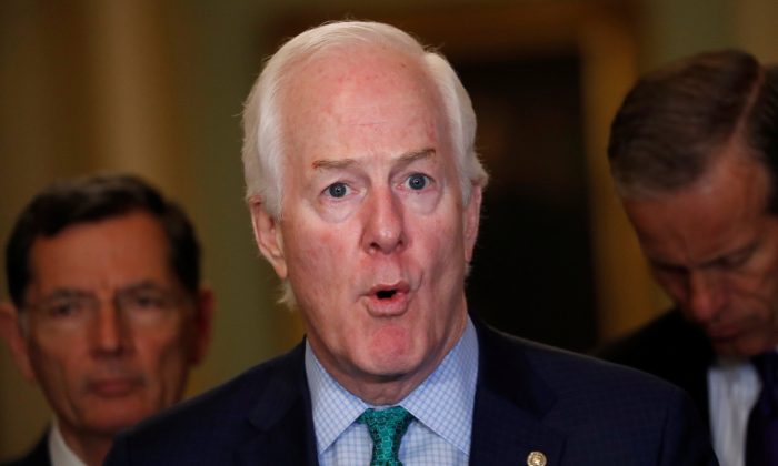 Senator John Cornyn speaks to the media during a news conference at the U.S. Capitol in Washington, on May 22, 2018. (Leah Millis/Reuters)