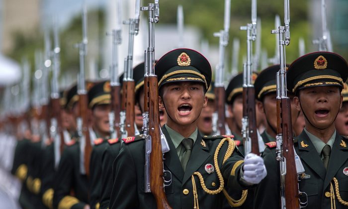China's Peoples' Liberation Army (PLA) soldiers march in Hong Kong in this file photo. (Lam Yik Fei/Getty Images)