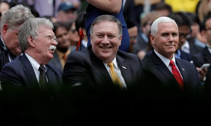 U.S. Secretary of State Mike Pompeo awaits the start of a joint news conference by U.S. President Donald Trump and Japan's Prime Minister Shinzo Abe as he sits between National Security Advisor John Bolton and Vice President Mike Pence in the Rose Garden of the White House in Washington, on June 7, 2018. (Reuters/Carlos Barria)