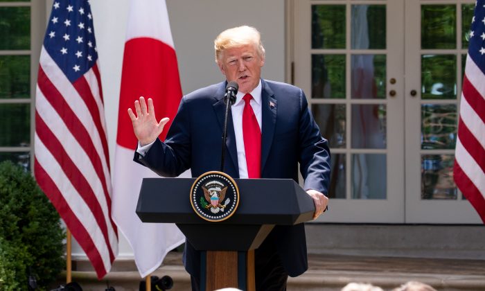 President Donald Trumps and the Prime Minister of Japan, Shinzō Abe, hold a joint press conference in the Rose Garden of the White House on June 7, 2018. (Samira Bouaou/The Epoch Times)