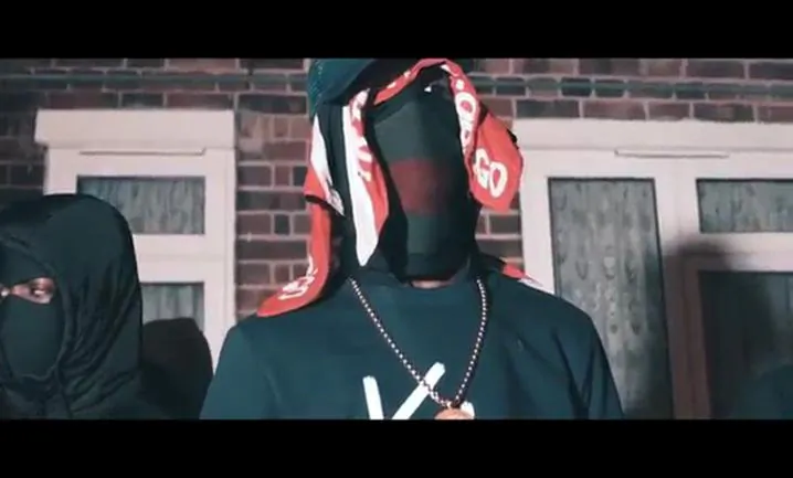 Micah Bedeau who, along with four others, pleaded guilty to charges of conspiracy to commit violent disorder, is seen in a still from the drill music video "No Hook" in an image released by the Metropolitan Police in London on June 7, 2018. (Metropolitan Police Handout via Reuters)