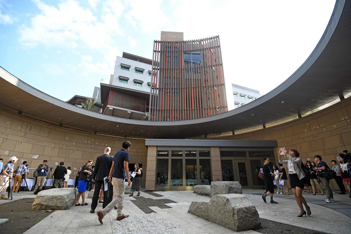 Journalists tour the new office complex of the American Institute in Taiwan (AIT) during a dedication ceremony in Taipei on June 12, 2018. - Washington on June 12 unveiled a multi-million-dollar new complex for its de facto embassy in Taiwan in what is hailed as a "milestone" in relations. (Sam Yeh/AFP/Getty Images)
