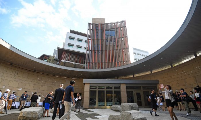 Journalists tour the new office complex of the American Institute in Taiwan (AIT) during a dedication ceremony in Taipei on June 12, 2018. - Washington on June 12 unveiled a multi-million-dollar new complex for its de facto embassy in Taiwan in what is hailed as a "milestone" in relations.  (Sam Yeh/AFP/Getty Images)
