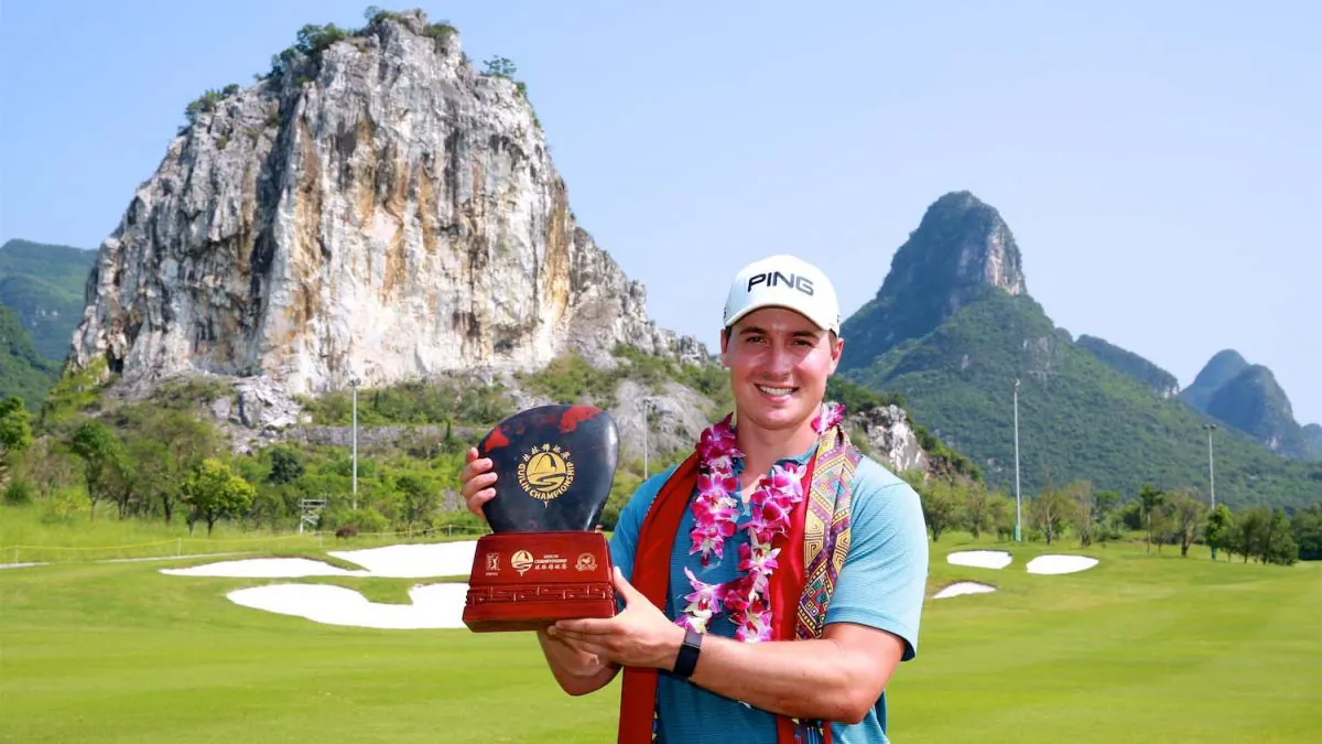Charlie Saxon of America displays the PGA Tour - Guilin Championship trophy, which he won on June 10. (PGA Tour Series-China / Zhuang Liu)