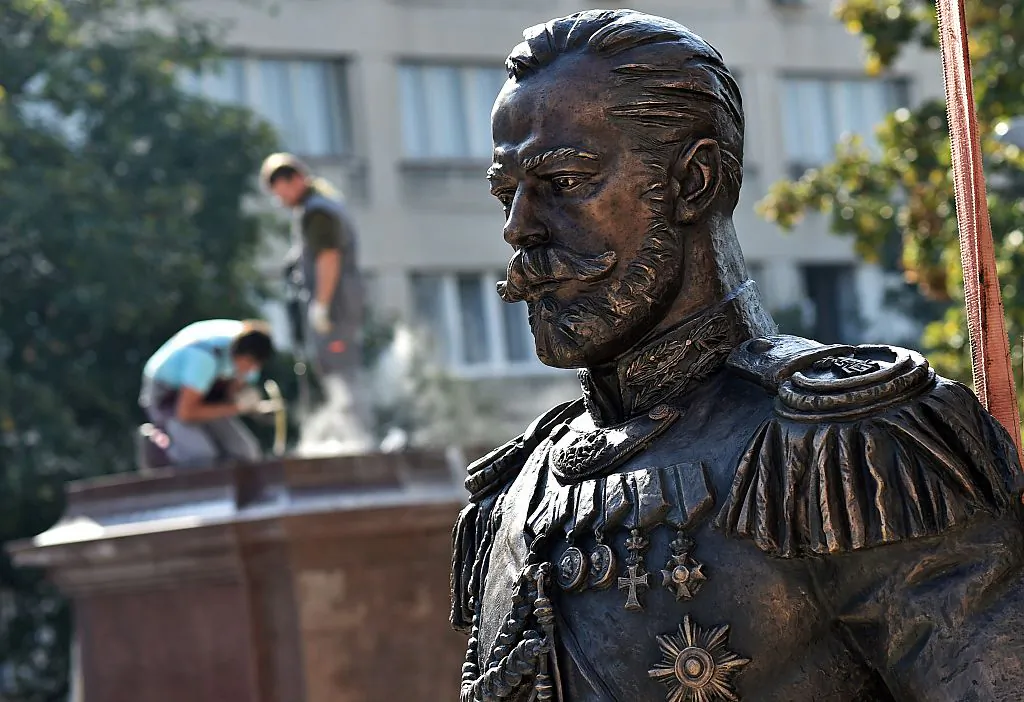 Workers prepare the plinth (L), where the monument of the last Russian Emperor, Czar Nicholas II, will be placed in Belgrade on October 13, 2014. While czarist rule over Russia ended in 1917, American administrations have continued to appoint unofficial administrative czars until this day. (ANDREJ ISAKOVIC/AFP/Getty Images)