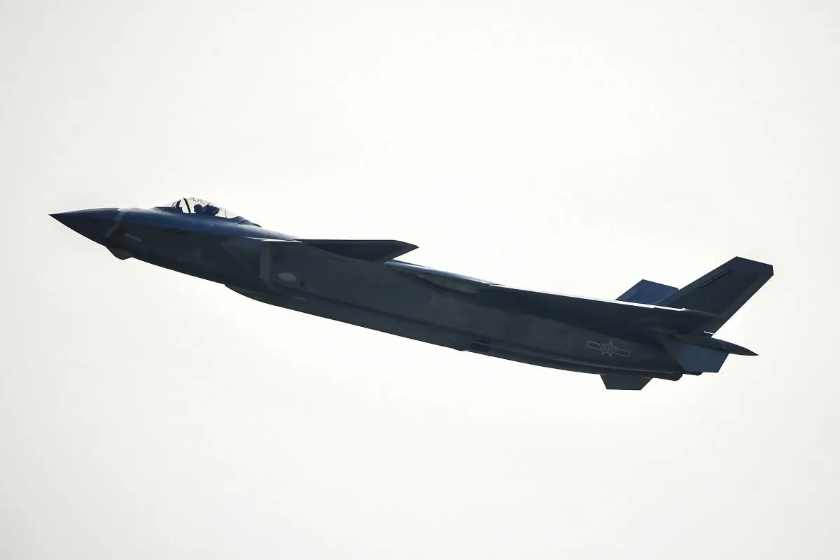 China’s J-20 fighter jet performs at Zhuhai Air Show in Zhuhai on Nov. 1, 2016. The J-20 is equipped with an advanced active electronically scanned array (AESA) radar, which could contain a semiconductor component called “field-programmable gate array.” (STR/AFP/Getty Images)