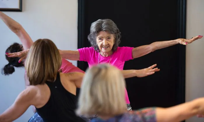 The 98-year-old Yoga Master Tao Porchon-Lynch(R) instructs a yoga class Jan. 16, 2017 in Hartsdale, New York. Dr. Marilyn Singleton argues that we need to take responsibility for our health by making good lifestyle choices. (DON EMMERT/AFP/Getty Images)