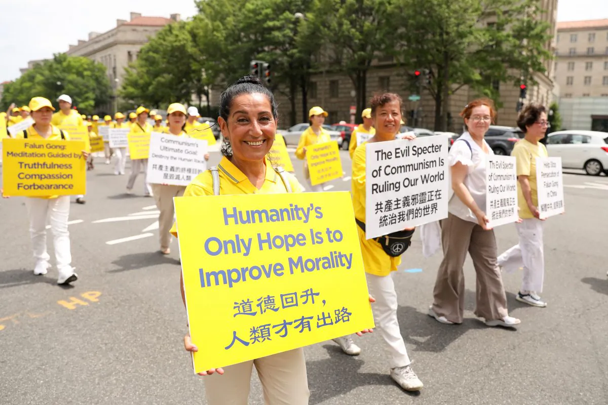 Falun Gong practitioner from Australia joins a Falun Dafa march in Washington on June 20, 2018. (Samira Bouaou/The Epoch Times)