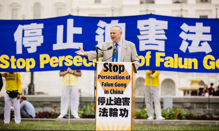 Rep. Dana Rohrabacher (R-Calif.) addresses a rally of 5,000 Falun Gong practitioners and calls for an end to the persecution of Falun Gong in China, in Washington on June 20, 2018. (Edward Dai/Epoch Times)