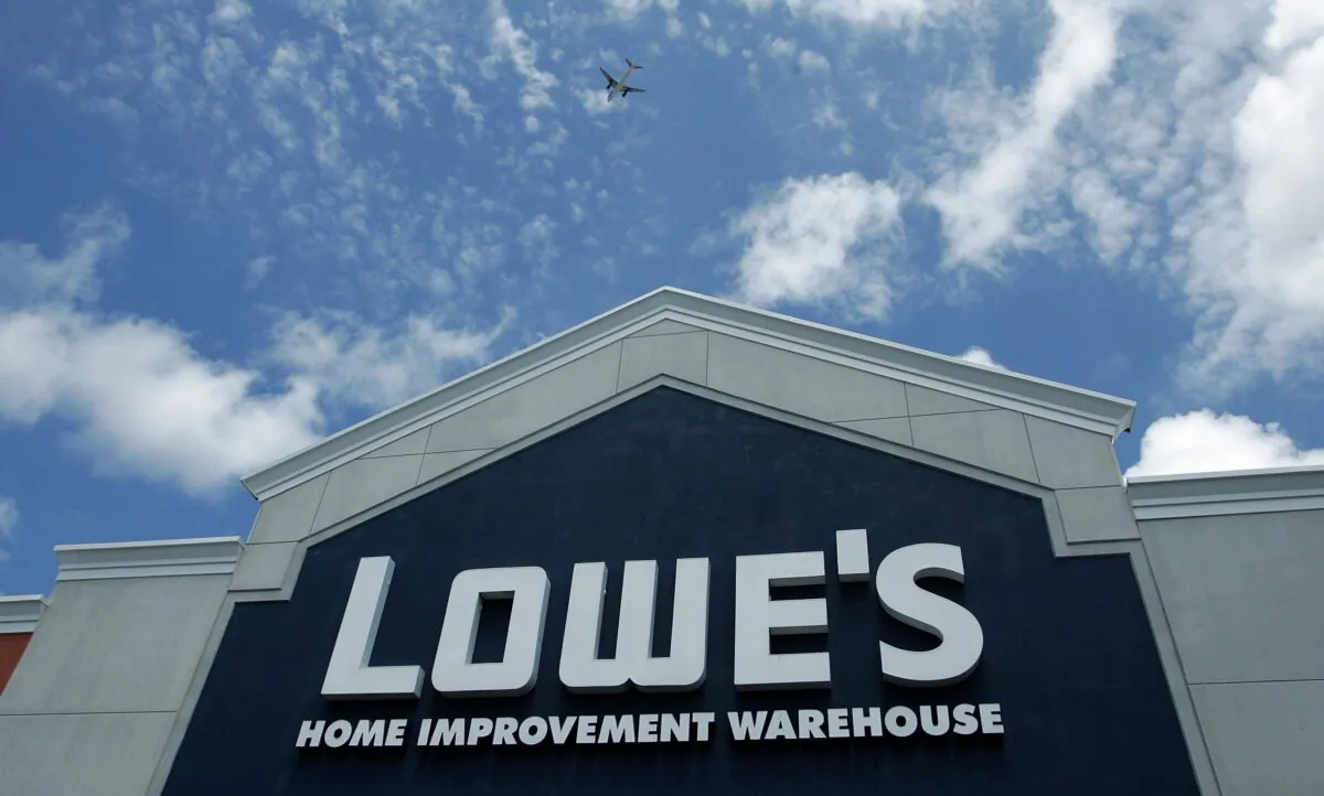 A sign on the exterior of a Lowe's home improvement warehouse store in San Bruno, California, on May 22, 2006. (Justin Sullivan/Getty Images)