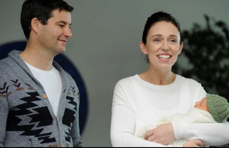 New Zealand Prime Minister Jacinda Ardern carries her newborn baby Neve Te Aroha Ardern Gayford with her partner Clarke Gayford as she walks out of the Auckland Hospital in New Zealand, June 24, 2018. (Reuters/Ross Land)