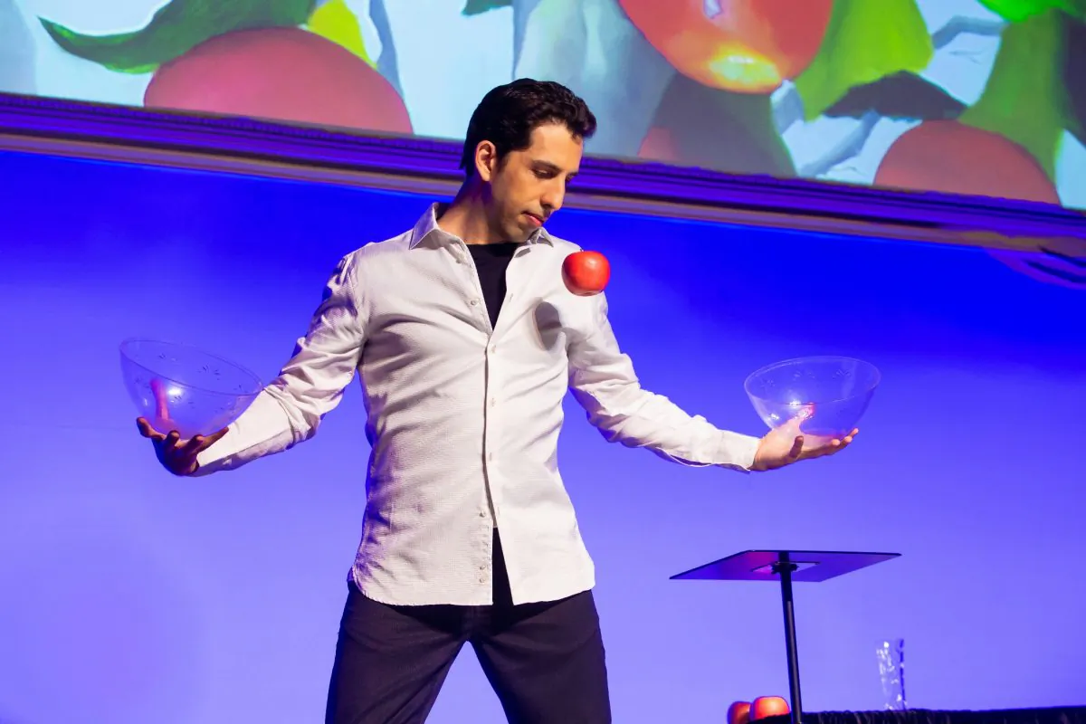 Illusionist Vitaly Beckman makes and apple float without wires in his show "Vitaly: An Evening of Wonders." (Jeremy Daniel)“