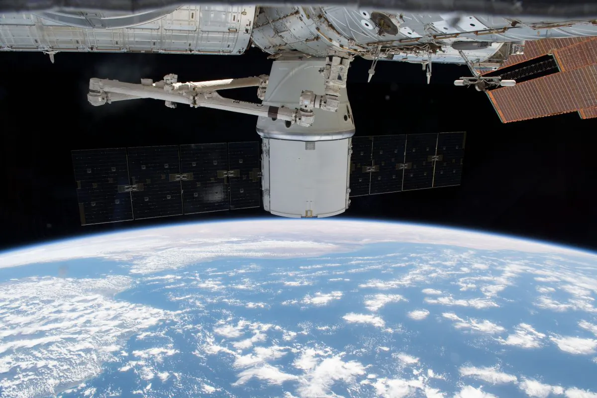 The SpaceX Dragon resupply ship was gripped by the Canadarm2 robotic arm on April 27, 2018 in the International Space Station. (Photo by NASA)