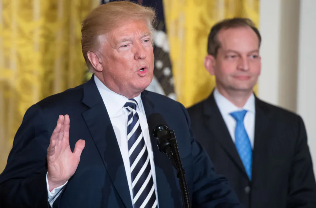 U.S. President Donald Trump speaks alongside Secretary of Labor Alexander Acosta (R) during the National Teacher of the Year reception in the East Room of the White House in Washington on May 2, 2018. (SAUL LOEB/AFP/Getty Images)