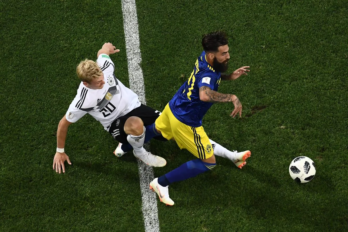 Germany's forward Julian Brandt (L) vies for the ball with Sweden's midfielder Jimmy Durmaz during the Russia 2018 World Cup match between Germany and Sweden  in Sochi on June 23, 2018. (Jewel Samad/AFP/Getty Images)