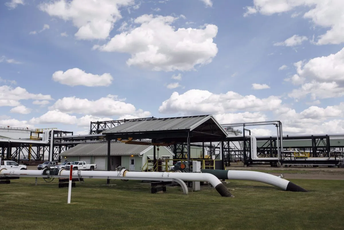 Kilometre 0 of the Trans Mountain pipeline system at the Kinder Morgan terminal in Edmonton on June 5, 2018. (The Canadian Press/Jason Franson)