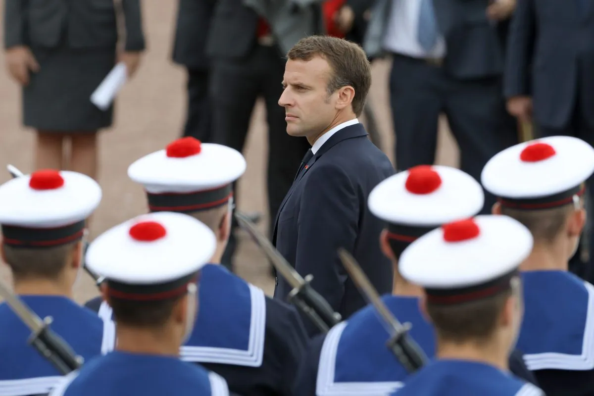 French President Emmanuel Macron reviews a troop of French navy soldiers on June 18, 2018 at the Mont Valerien national memorial in Suresnes, outside Paris. (Ludovic Marin/AFP/Getty Images)