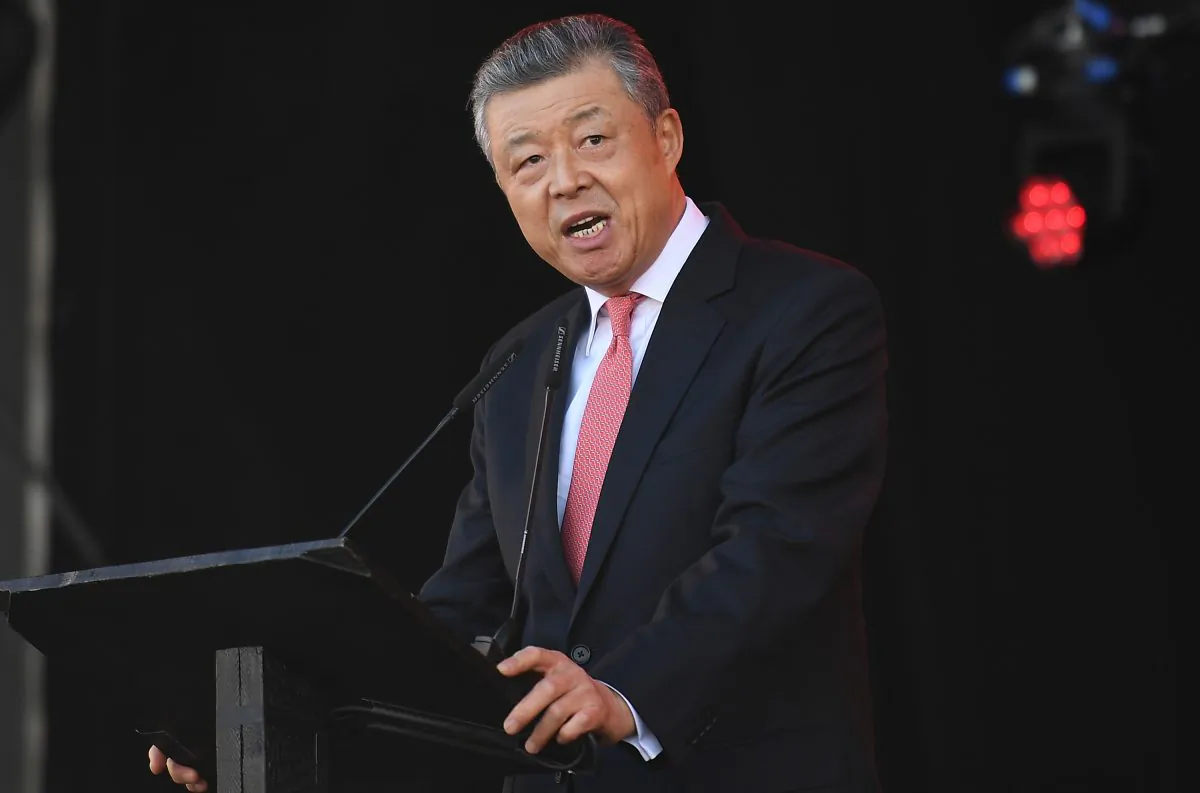 China’s ambassador to the UK, Liu Xiaoming speaks to the gathered crowd in Trafalgar Square as people celebrate the Chinese Lunar New Year in central London on Feb. 18, 2018. (Justin Tallis/AFP/Getty Images)