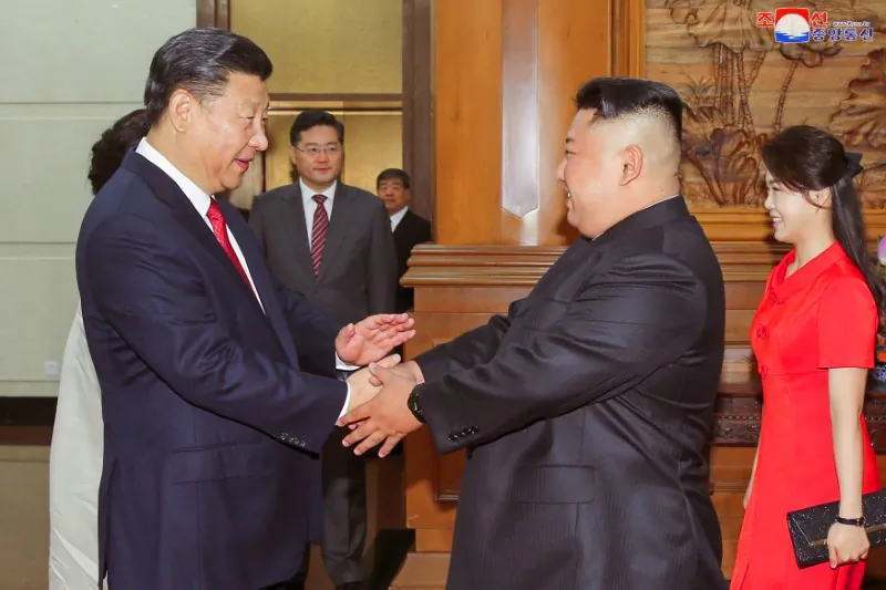 Chinese leader Xi Jinping shakes hands with North Korean leader Kim Jong Un in Beijing in this undated photo released by North Korea's Korean Central News Agency on June 20, 2018. (KCNA via Reuters)