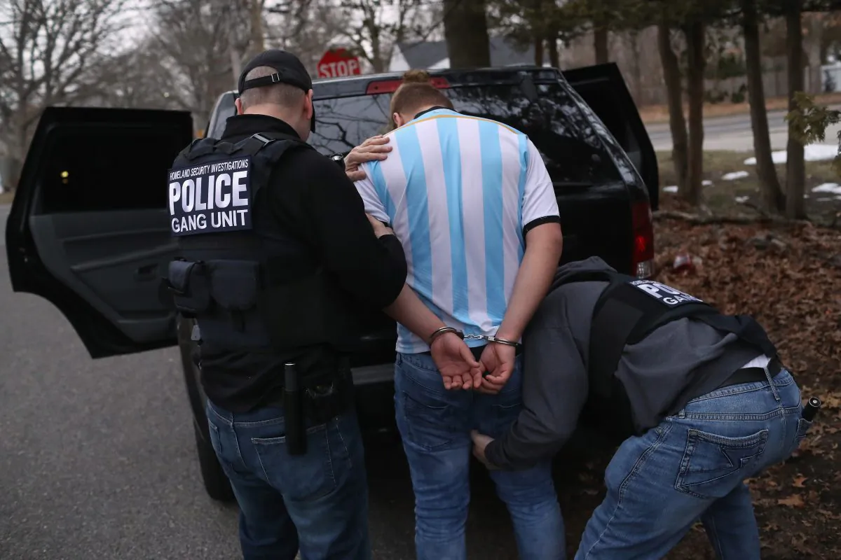 ICE Homeland Security Investigations agents arrest a suspected MS-13 gang member and Honduran national in Brentwood, N.Y., on March 29, 2018. (John Moore/Getty Images)
