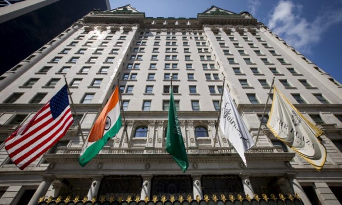 Flags fly over the entrance of The Plaza Hotel in midtown Manhattan, New York, on August 19, 2015.  (Reuters/Brendan McDermid)
